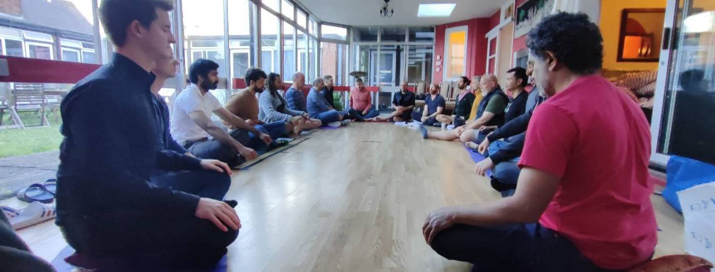 Men sitting in a circle