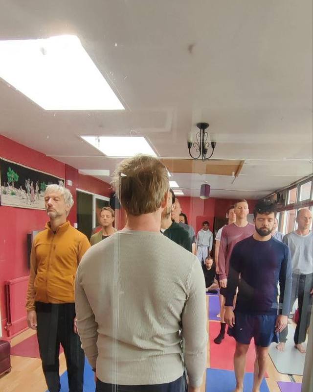 Men standing together at the start of a session